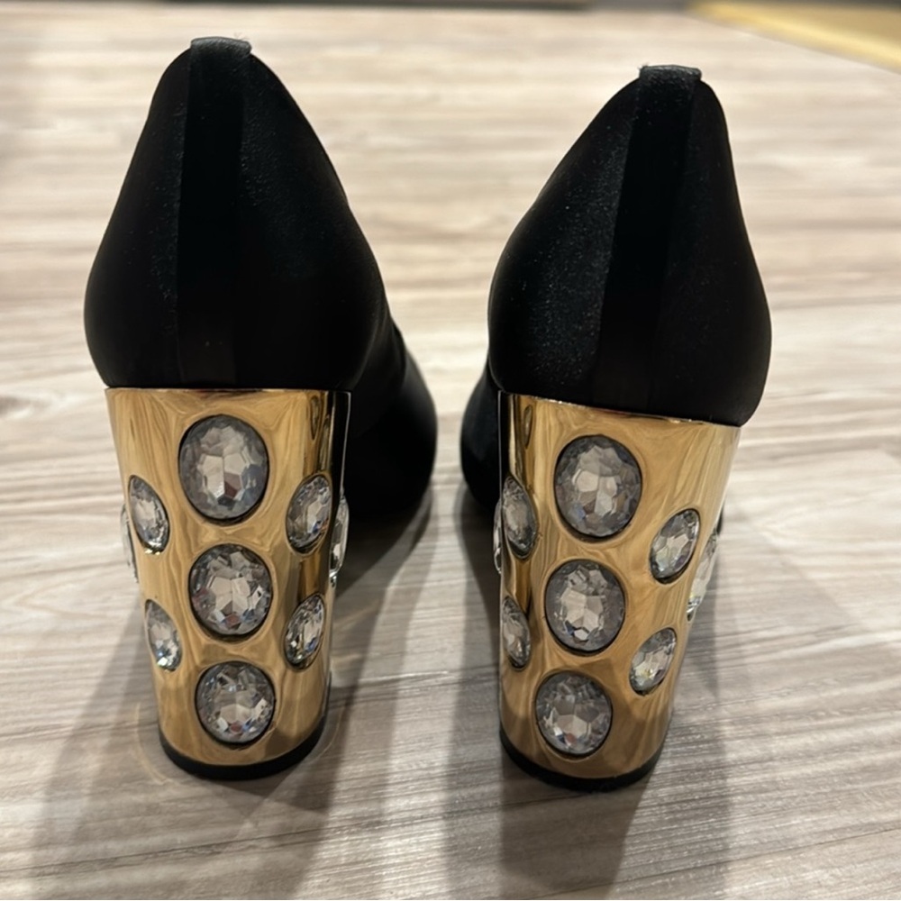 Tory Burch Black Heels with Gold Accents - Picture 2 of 6